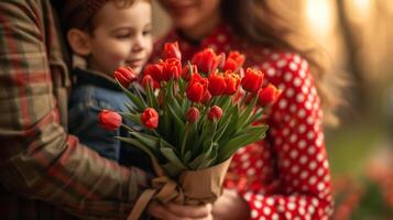 ai generado chico y papá dar un ramo de flores de rojo tulipanes a un mujer en un rojo polca punto vestir foto