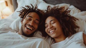 AI generated Young couple lying in bed and laughing photo