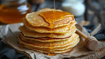 AI generated a stack of fresh thick pancakes in the kitchen next to a jar of honey and sour cream photo