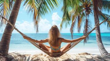 AI generated A beautiful girl in a bikini lies in a hammock between palm trees on the ocean shore photo
