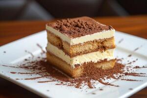 AI generated An indulgent tiramisu, layered with espresso-soaked ladyfingers and mascarpone cream, dusted with cocoa powder photo