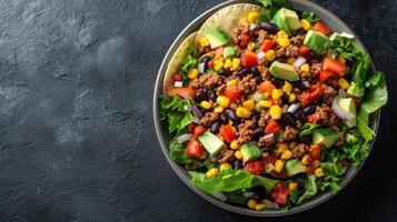 AI generated A Mexican-inspired taco salad loaded with seasoned ground beef, black beans photo