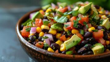 AI generated A southwestern-inspired avocado and black bean salad with corn, red onion, and lime-cilantro dressing photo