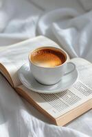 AI generated A minimalist depiction of an open book and a cup of coffee on a white background photo