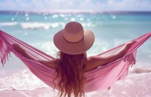 AI generated woman relaxing at beach in large sunhat on hammock photo