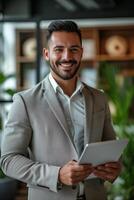 AI generated A cheerful young Latin business executive holding a tablet in the office photo