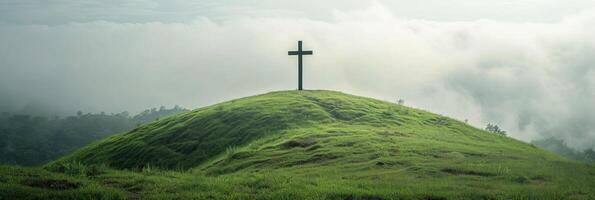 AI generated A Christian cross standing tall atop a lush green hill. large copyspace area, offcenter composition photo