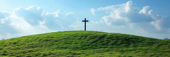 AI generated A Christian cross standing tall atop a lush green hill. large copyspace area, offcenter composition photo