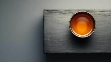 AI generated Minimalist photograph highlighting the simplicity and beauty of a cup of tea photo