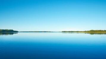 AI generated A tranquil lake reflecting the clear blue sky, creating a sense of serenity and inner peace photo