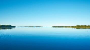 AI generated A tranquil lake reflecting the clear blue sky, creating a sense of serenity and inner peace photo