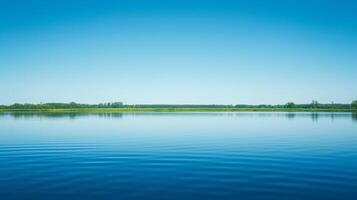 AI generated A tranquil lake reflecting the clear blue sky, creating a sense of serenity and inner peace photo