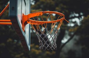 ai generado un naranja baloncesto aro con negro baloncesto cesta foto