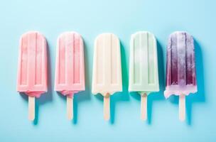 AI generated pastel sweet ice lollies are on a pink and blue background photo