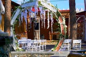 Congratulatory holiday arch with white flowers.Birthday,wedding,corporate photo