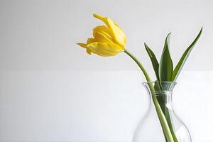 AI generated two yellow flowers in a clear vase on a table photo