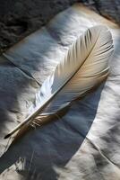 AI generated a white feather resting on a piece of paper photo