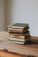 AI generated a stack of books sitting on top of a wooden table photo
