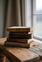 AI generated a stack of books sitting on top of a wooden table photo