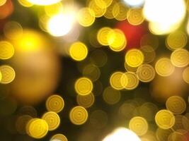 abstract bokeh blur light circle red yellow and white glowing flare pattern black background photo