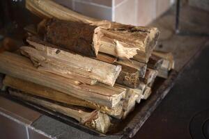 Chopped firewood. Wooden firewood for kindling the stove. Wood fuel. photo