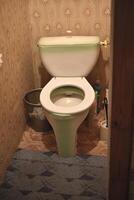 The bathroom. Toilet bowl with a cistern. Toilet. photo