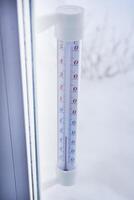 Alcohol street thermometer. The temperature meter. The temperature is low outside. photo