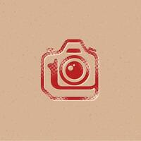 Camera halftone style icon with grunge background vector illustration