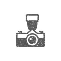 Old camera icon in grunge texture vector illustration