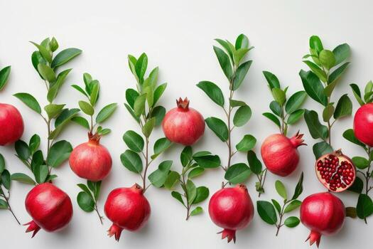 AI generated Pattern of Pomegranates With Leaves on White Background A group of pomegranates, complete with leaves, arranged neatly on a white background. photo
