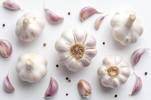 AI generated Group of Garlics on White Background Several garlic bulbs are arranged and placed on a white table. photo