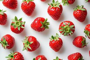 AI generated A Group of Strawberries Arranged on a White Surface A pattern of ripe strawberries, impeccably arranged, adorning a clean white surface. photo