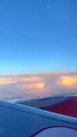 Beautiful view of the sun shining from the airplane window. video