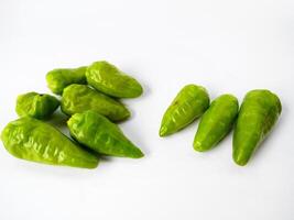 Cayenne pepper on a white background photo