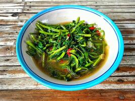 Indonesian cuisine Stir fried kale photo