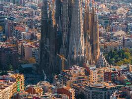 Aerial view of Barcelona City Skyline and Sagrada Familia Cathedral at sunset photo