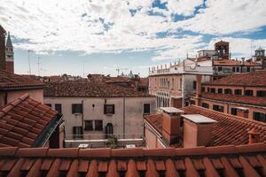 Tranquil Venice Serene Cityscape View with Red Roofs and Charming Buildings photo