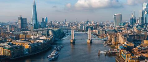 Aerial view of the Iconic Tower Bridge connecting Londong with Southwark photo