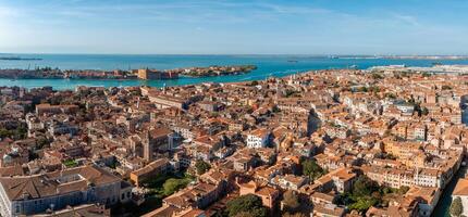 Aerial View of Venice near Saint Mark's Square, Rialto bridge and narrow canals. photo