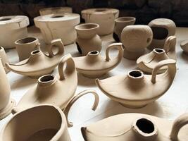 Clay blanks for a kerosene lamp in a pottery workshop. Close up photo