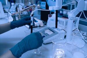 Asian scientist working in the lab,Doing experiment for product,The researchers analyzed to find the results of the experiment. photo