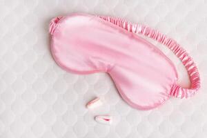 Silk sleep mask, earplugs, orthopedic pillow. All conditions for good deep sleep. photo