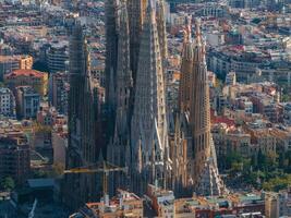 Aerial view of Barcelona City Skyline and Sagrada Familia Cathedral at sunset photo