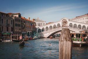 Tranquil Gondola Floating on Venice Waterway - Serene Italian Cityscape photo