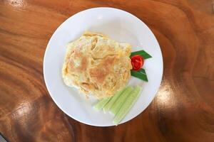 omelette, omelet or deep fried egg and rice photo