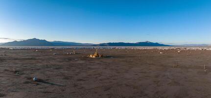 Aerial view of the festival in a desert with beautiful art installations photo