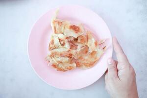 roti or naan , fried roti with sweetened condensed milk photo