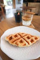 croffle or  croissant waffle and coffee ,dirty coffee or Japanese coffee photo