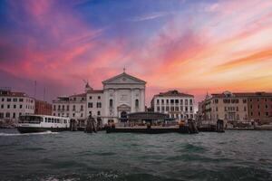 Unique Gloomy Venice Cityscape View from Boat on Cloudy Day with Landmarks photo