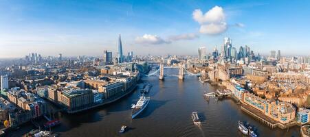 Aerial view of the Iconic Tower Bridge connecting Londong with Southwark photo